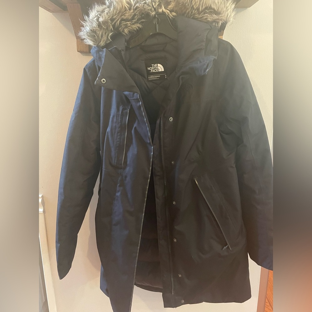 The North Face Arctic parka size S. A very warm and rain repellent jacket.